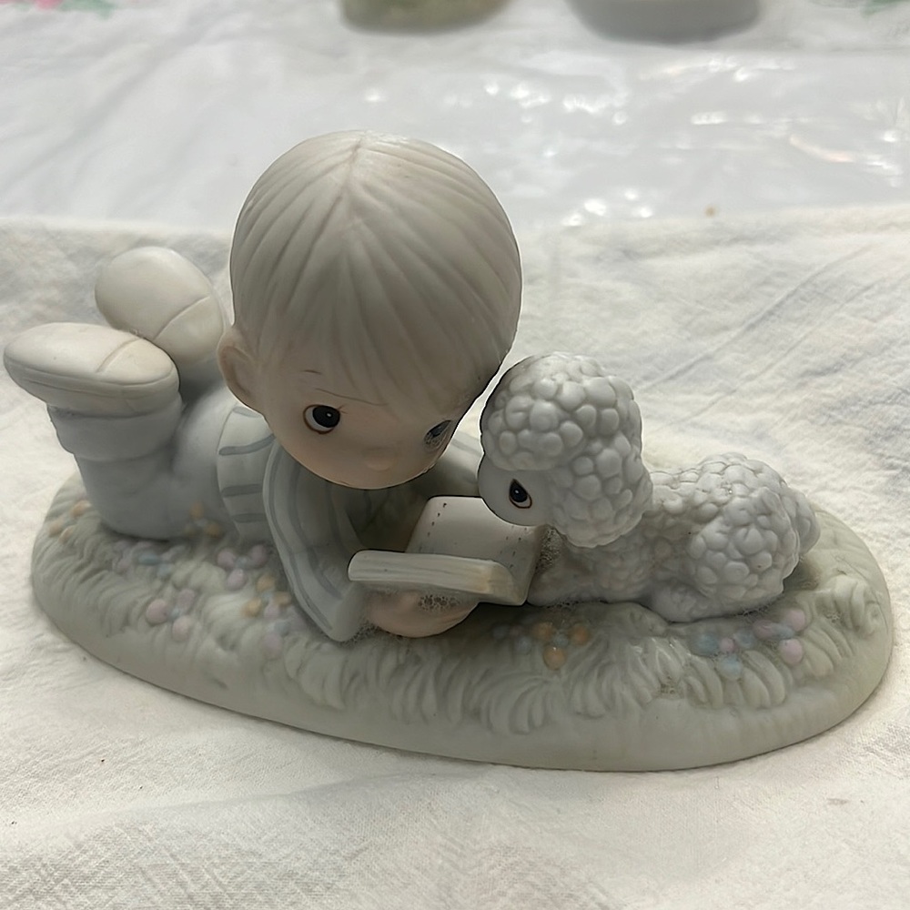 Adorable boy with lamb precious moments